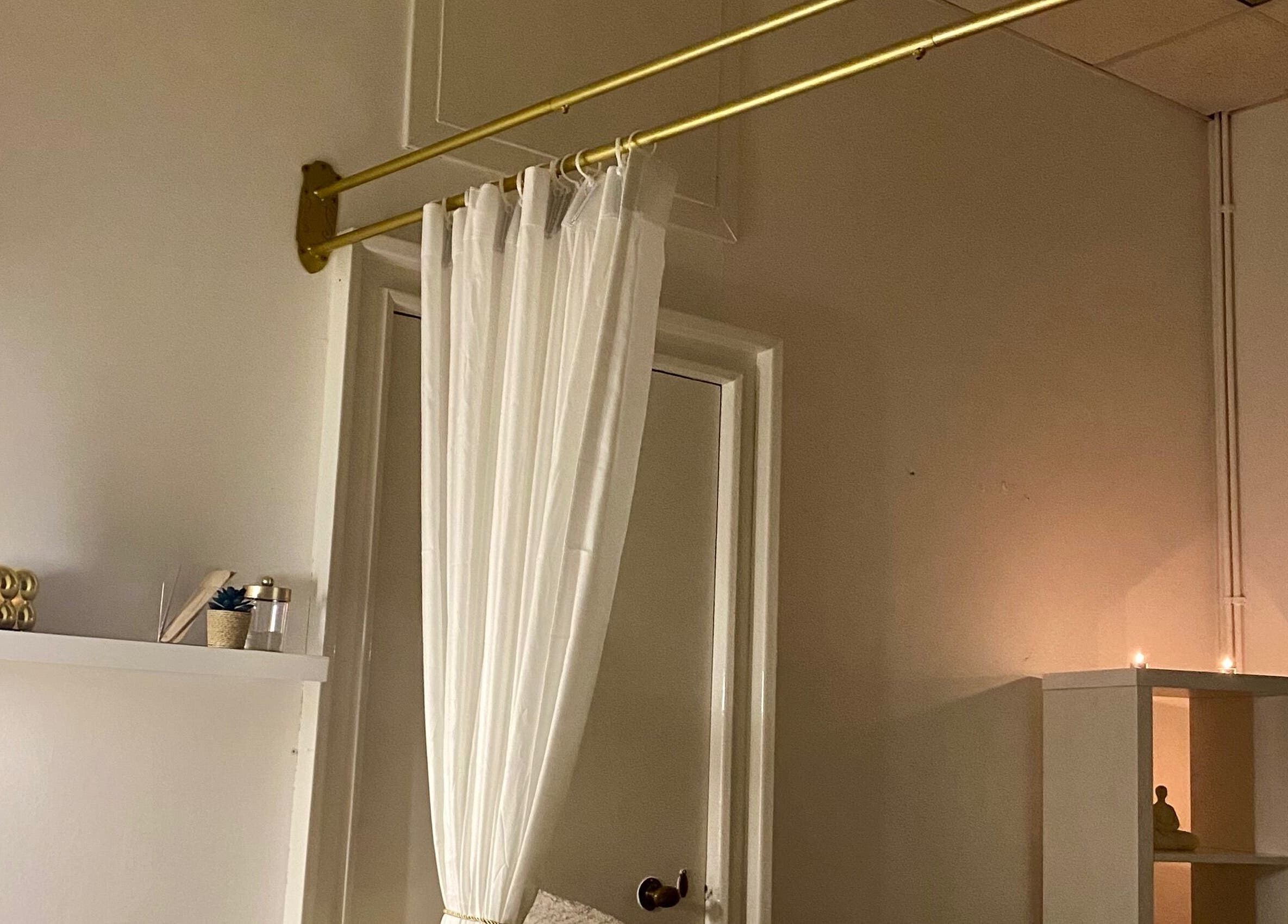 Cozy treatment room at Blossom Hair & Beauty, Dumbarton, Scotland, GB featuring calming decor and soft lighting.