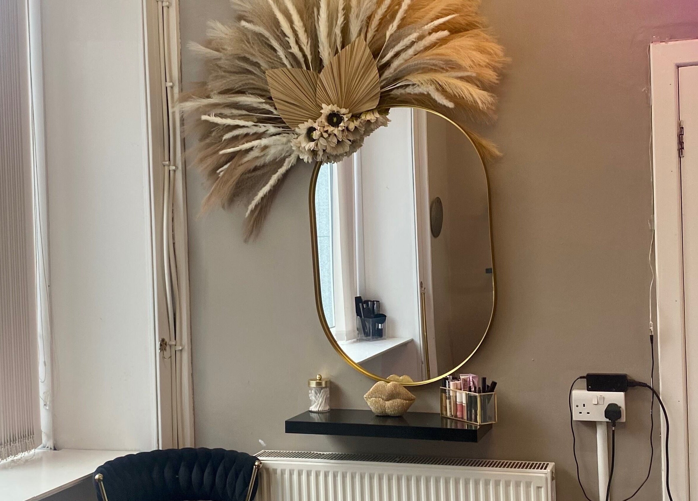 Chic gold mirror and decor at Blossom Hair & Beauty, Dumbarton, Scotland, GB.