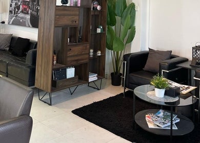 Chic lounge seating at RASL: Refined Artisan Salon Lounge, Singapore, Singapore, SG, with modern decor.