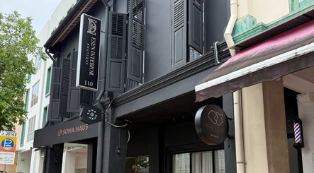 Exterior of RABL: Refined Artisan Barber Lounge in Singapore, Singapore, SG with chic black facade.