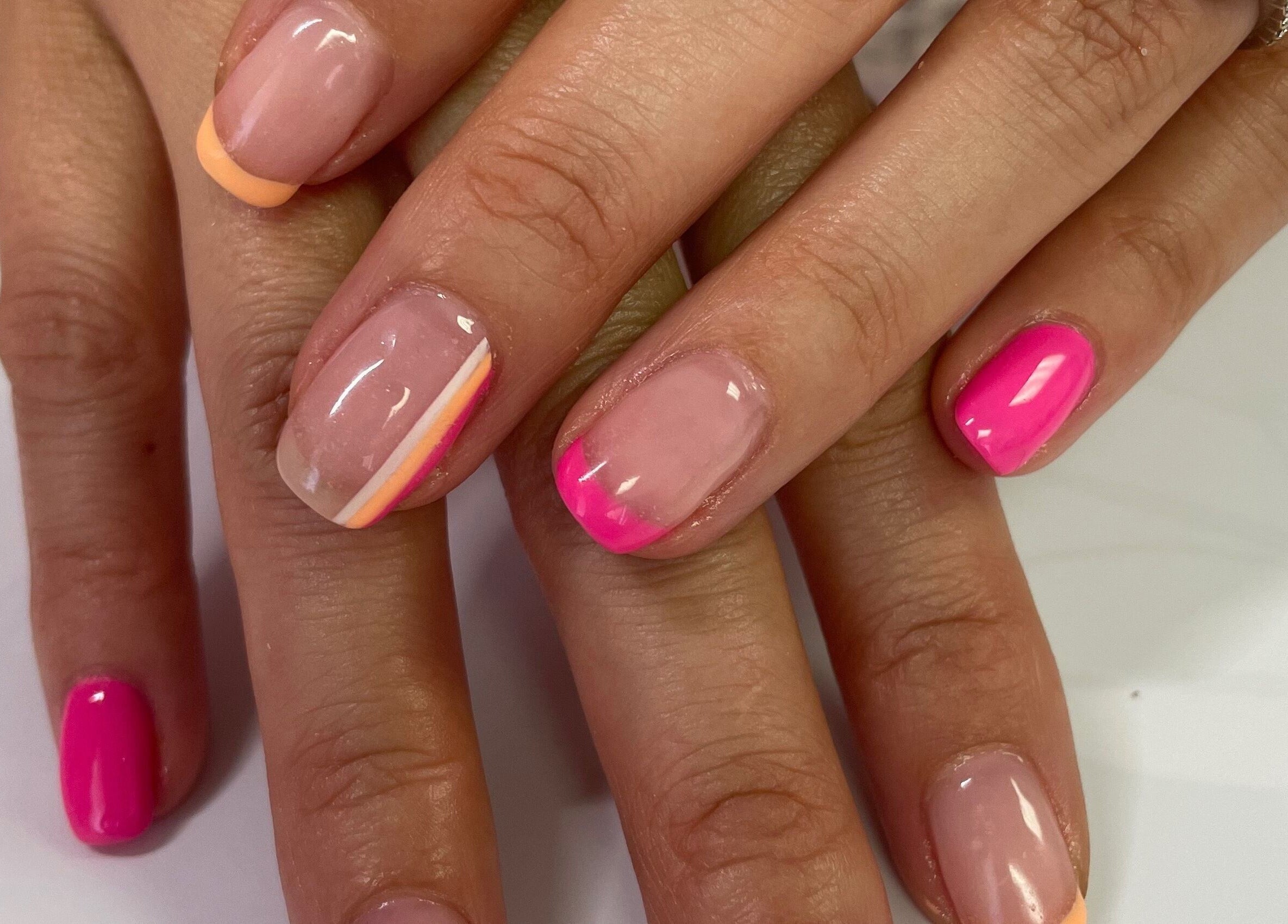 Stylish pink and orange nail art at Brushed Nails by Nobi, Randburg, Gauteng, ZA.
