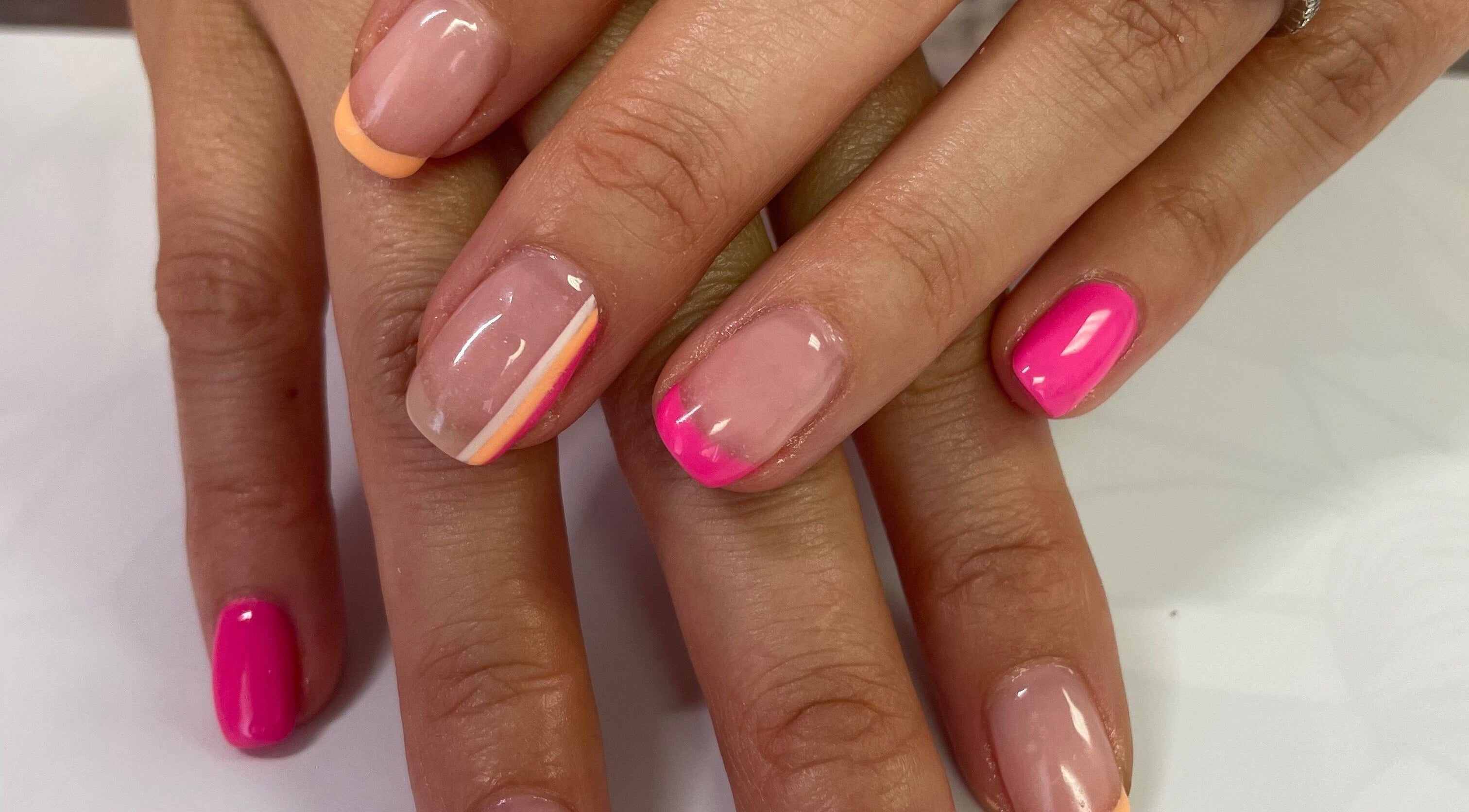 Stylish pink and orange nail art at Brushed Nails by Nobi, Randburg, Gauteng, ZA.