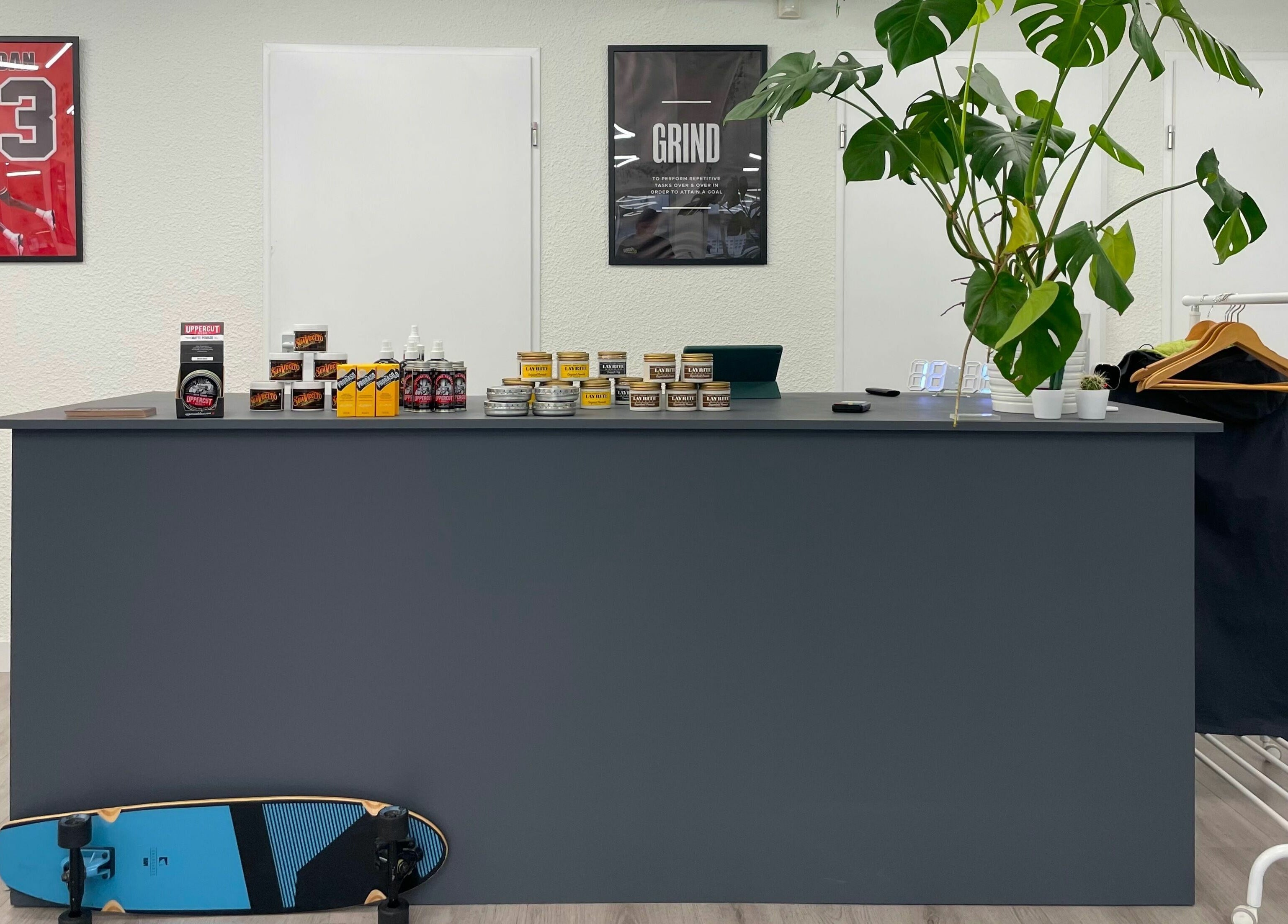 Front desk with grooming products at Daily Grind Barbershop, Rotterdam, Zuid-Holland, NL.