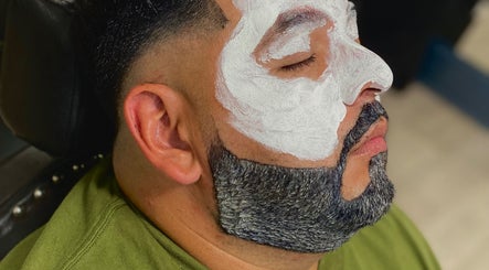 Man enjoying a facial treatment at Johnnyblades, Chicago, Illinois, US.