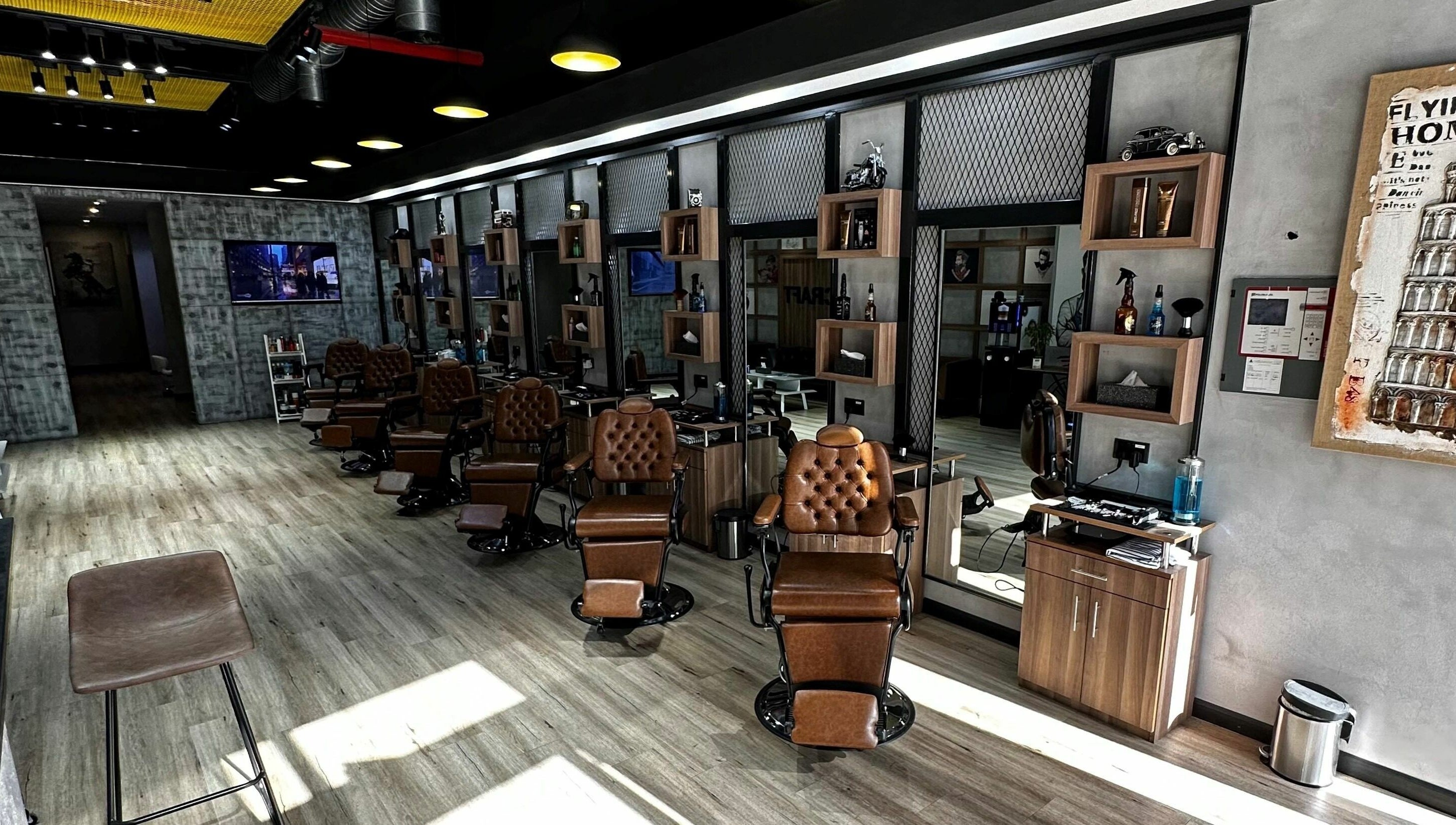 Sophisticated interior of Blade Craft in Dubai, Dubai, AE with vintage barber chairs and modern amenities.