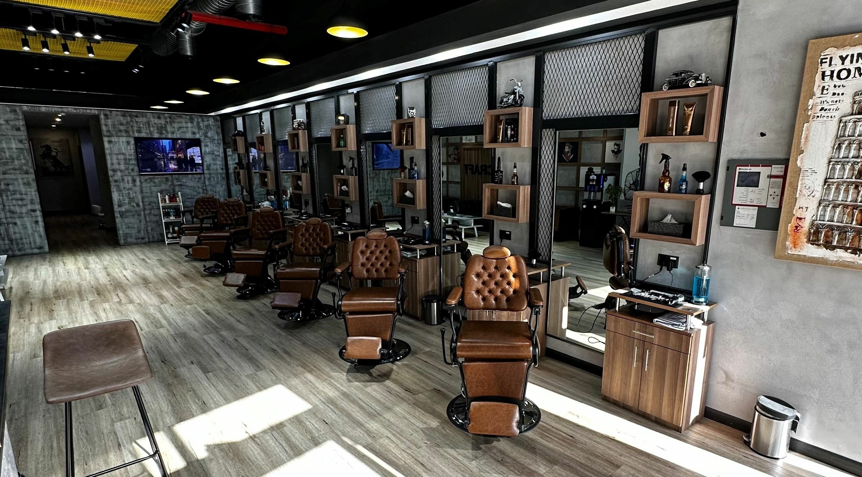 Sophisticated interior of Blade Craft in Dubai, Dubai, AE with vintage barber chairs and modern amenities.