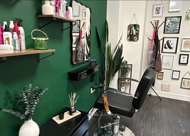 Modern hairdressing chair and decor at Morgan Mc Adams Hairdressing in Nottingham, England, GB.