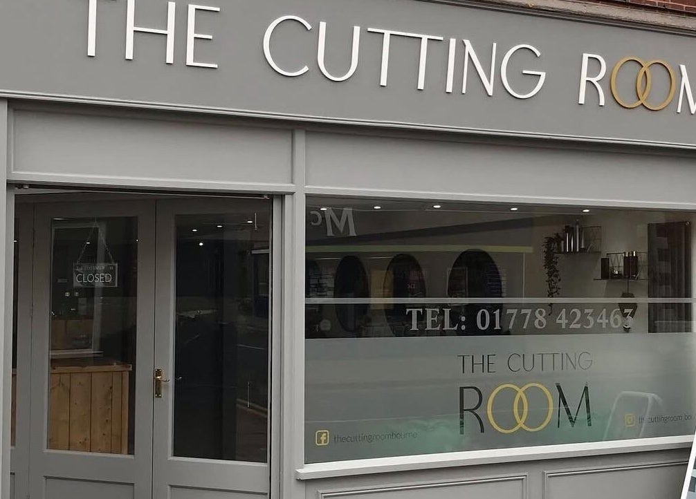 Front view of modern salon at thehideaway_hayley in Bourne, England, GB, showcasing its sleek design.