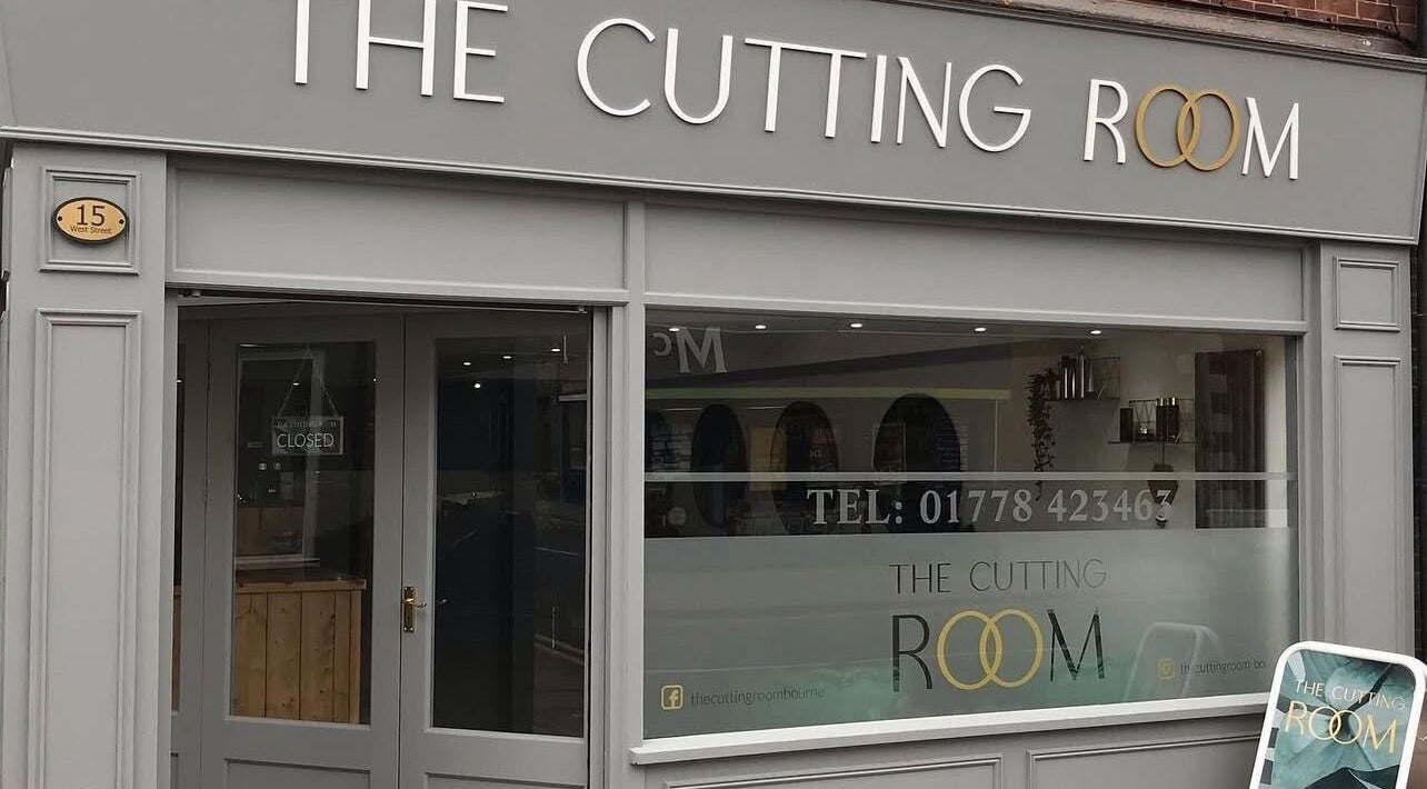 Front view of modern salon at thehideaway_hayley in Bourne, England, GB, showcasing its sleek design.