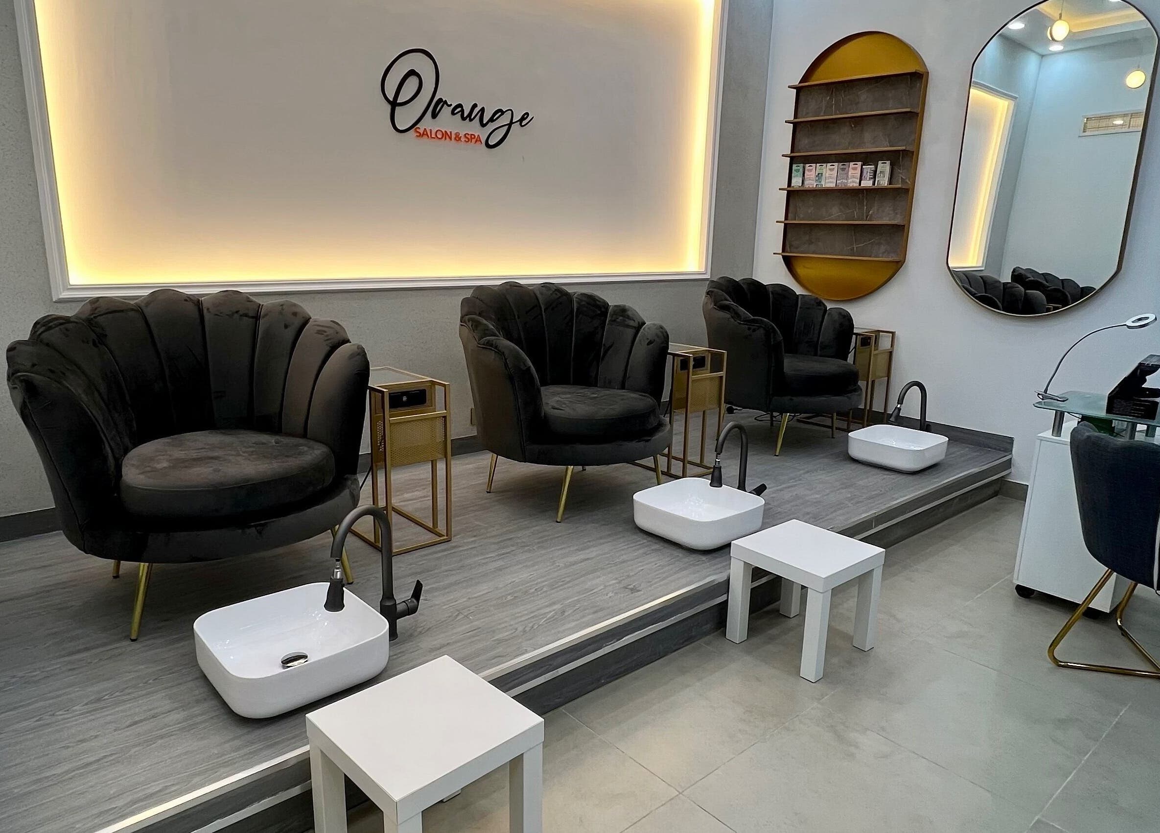 Luxurious pedicure chairs at Orange Spa, Muscat Governorate, OM, offering a relaxing atmosphere.