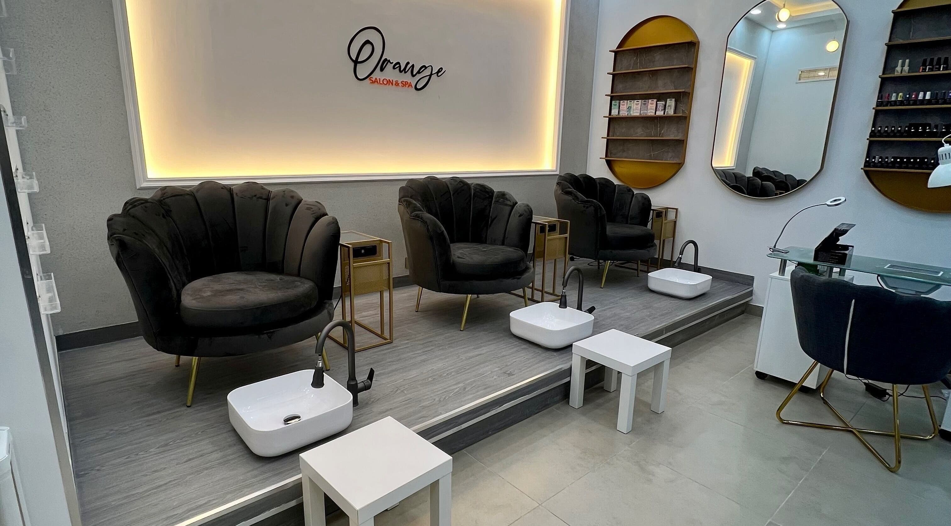 Luxurious pedicure chairs at Orange Spa, Muscat Governorate, OM, offering a relaxing atmosphere.