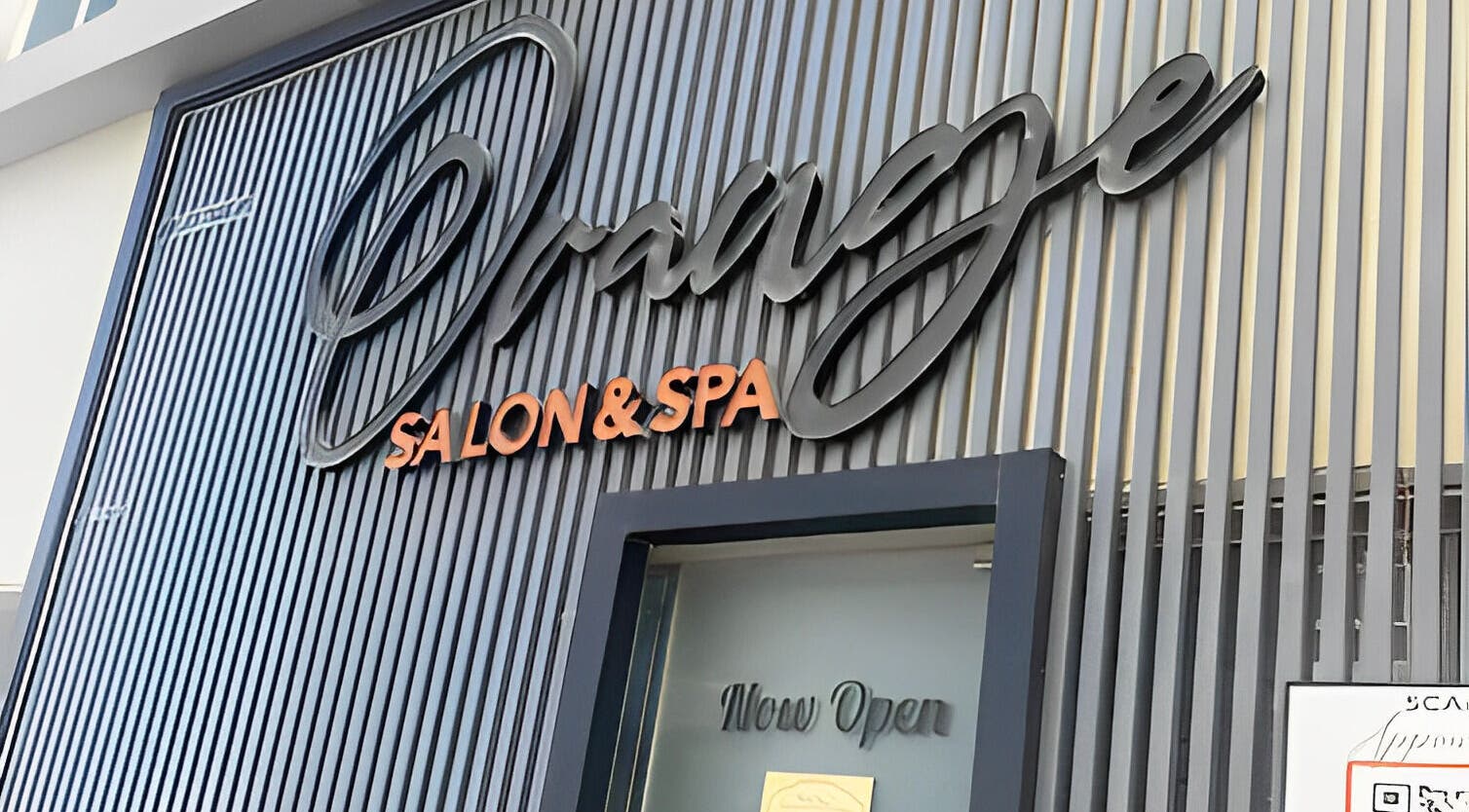 Entrance of Orange Spa in Muscat, Muscat Governorate, OM, highlighting modern signage.