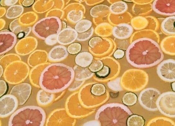 Citrus slices in spa water at Melarossa Spa and Wellness, Batang Kali, Selangor, MY, offering a refreshing experience.