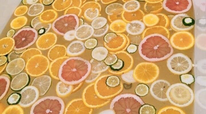 Citrus slices in spa water at Melarossa Spa and Wellness, Batang Kali, Selangor, MY, offering a refreshing experience.
