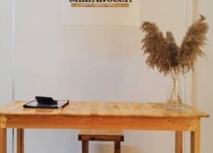 Minimalist wooden desk at Melarossa Spa and Wellness, Batang Kali, Selangor, MY elegantly styled with a vase.