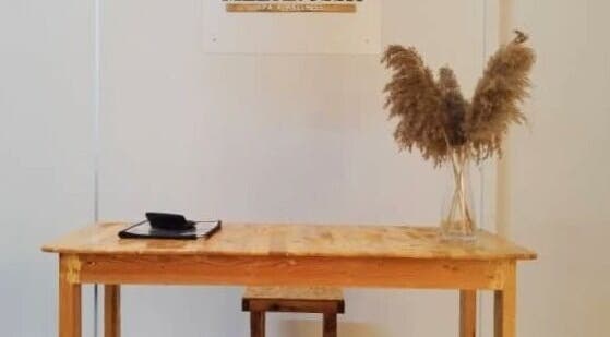 Minimalist wooden desk at Melarossa Spa and Wellness, Batang Kali, Selangor, MY elegantly styled with a vase.