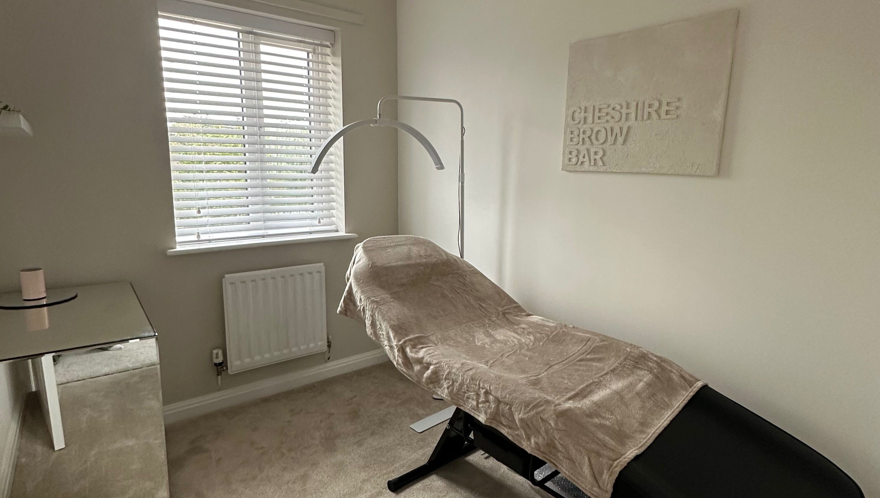Cheshire Brow Bar's tranquil treatment room in Winsford, England, GB with a comfortable reclined chair.
