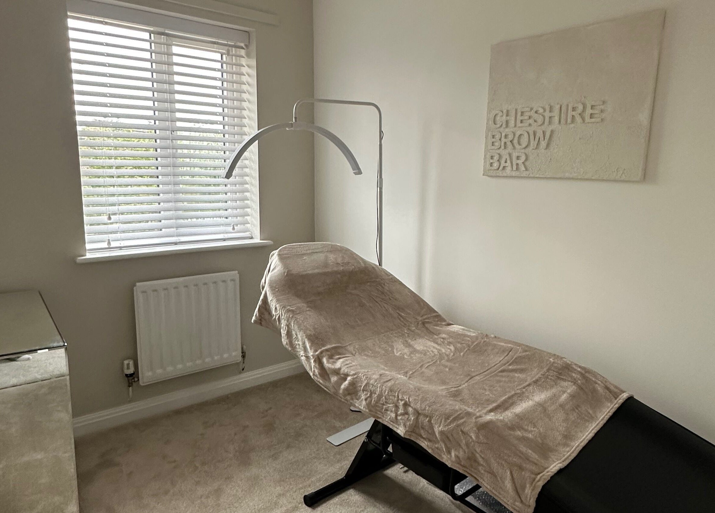 Cheshire Brow Bar's tranquil treatment room in Winsford, England, GB with a comfortable reclined chair.