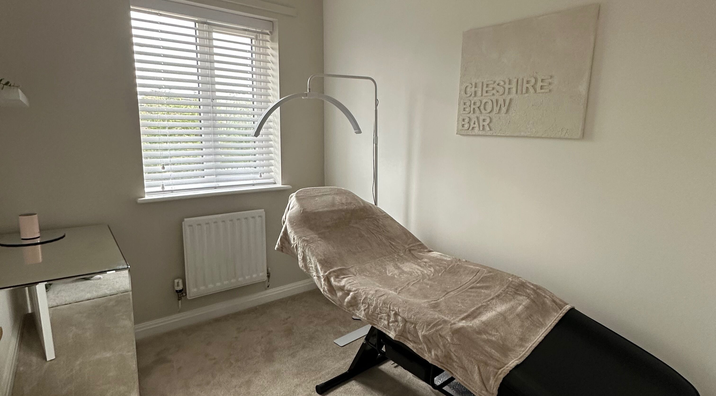 Cheshire Brow Bar's tranquil treatment room in Winsford, England, GB with a comfortable reclined chair.