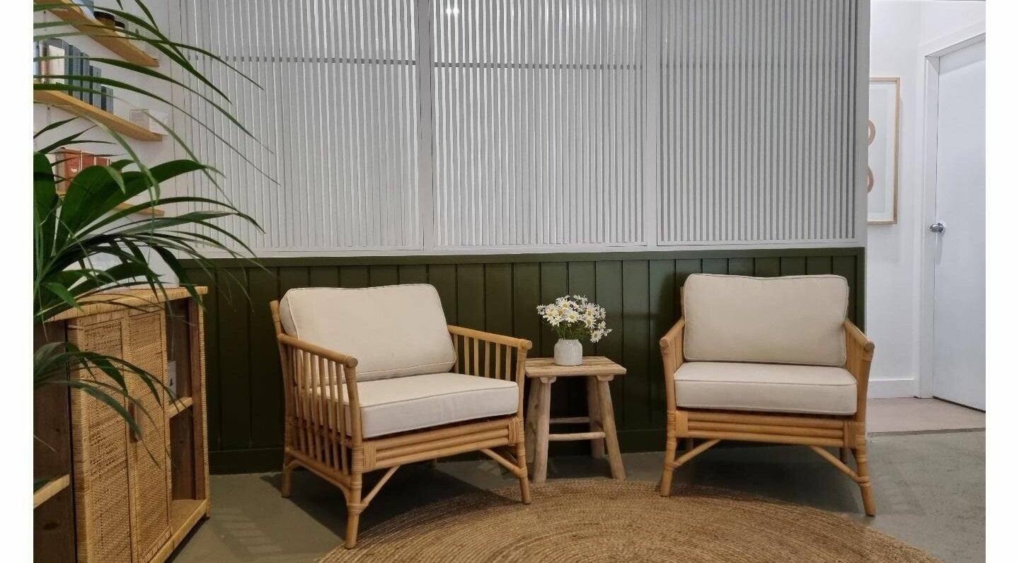 Elegant seating area at Slow by Seed in Orange, New South Wales, AU featuring wooden chairs and a cozy atmosphere.