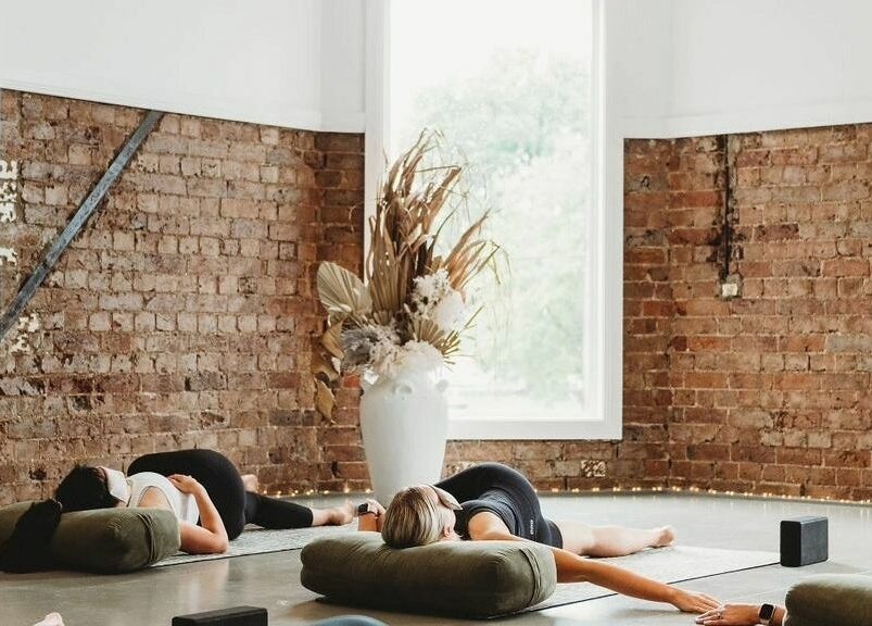 Yoga practice at Slow by Seed, Orange, New South Wales, AU. Tranquil setting with natural decor.