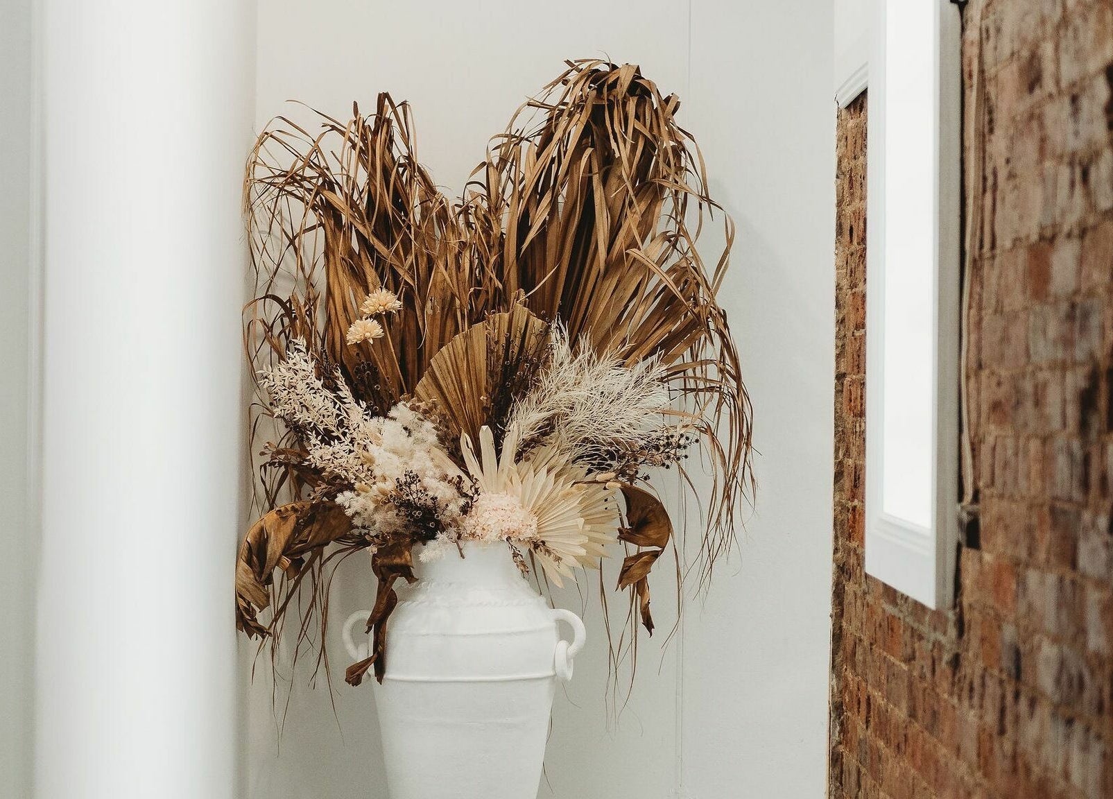 Dry floral arrangement at Slow by Seed, Orange, New South Wales, AU, enhancing rustic ambiance.