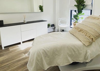 Serene therapy room at COCO ROSE BEAUTY, St Austell, England, GB, showcasing elegant decor and cozy ambiance.