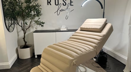 Relaxing treatment room at COCO ROSE BEAUTY, St Austell, England, GB features a plush recliner and ambient lighting.