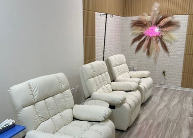 Comfortable lounge chairs at Harmony Medical Spa, Doral, Florida, US offer a tranquil environment.