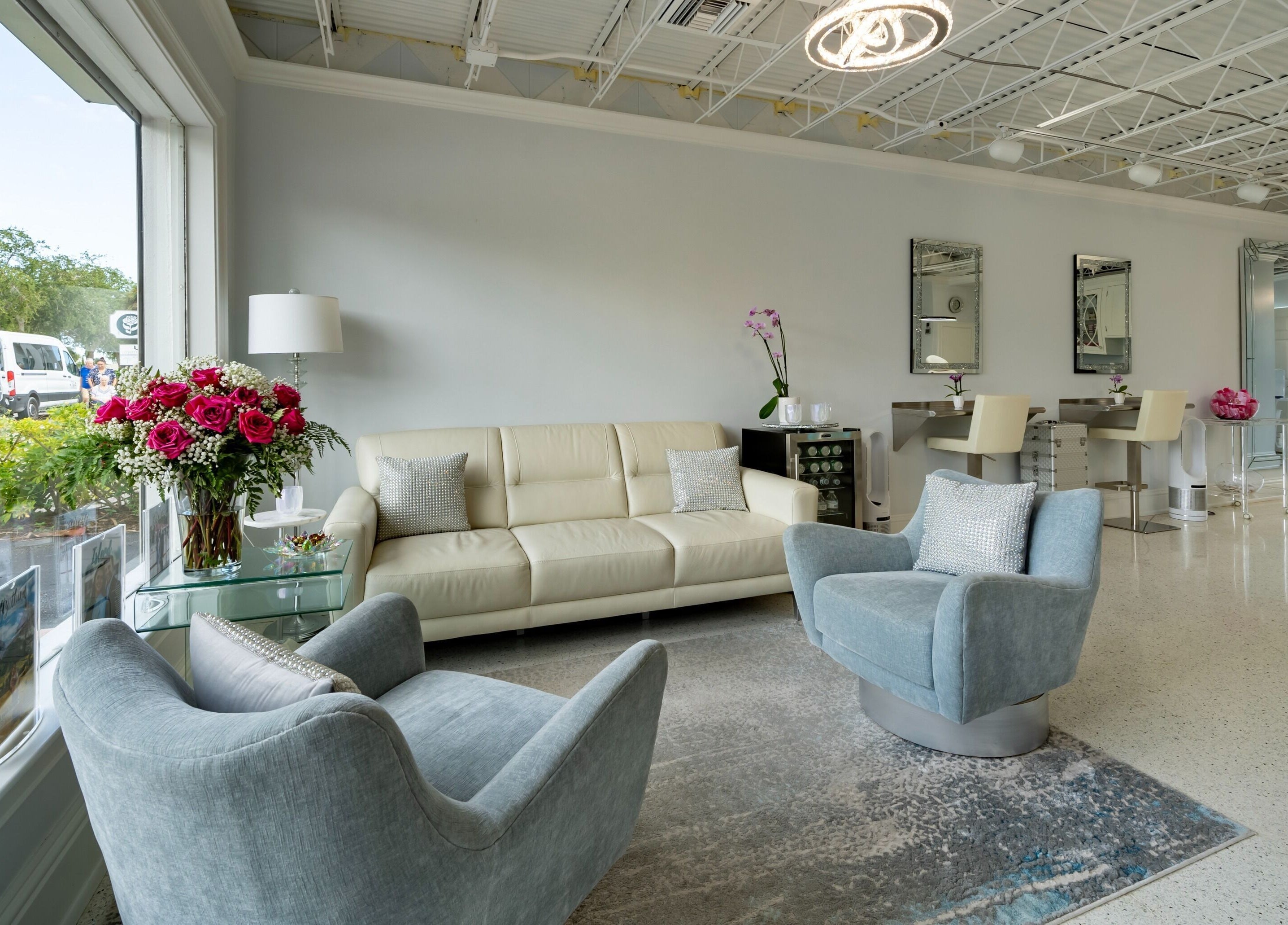 Modern lounge at By Pri, Vero Beach, Florida, US with elegant seating and floral decor.