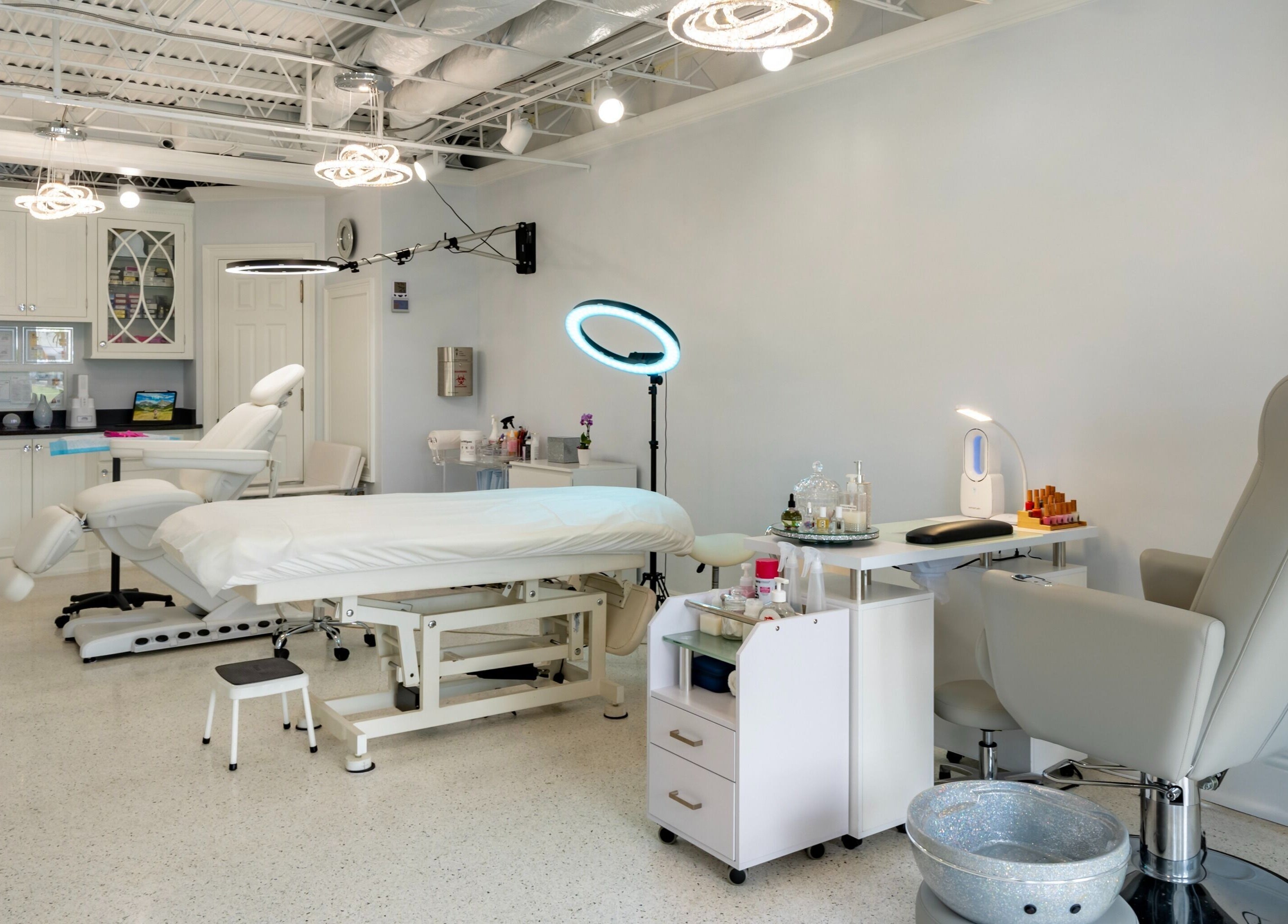 Beautiful spa room at By Pri in Vero Beach, Florida, US with treatment bed and soft lighting.