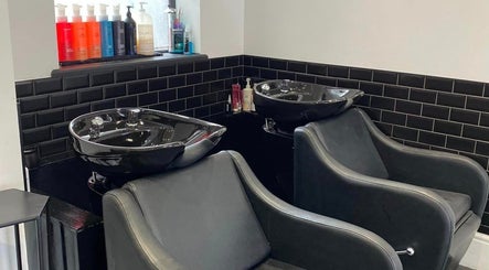 Modern wash stations at Atelier Hair & Beauty Studio in Bolton, England, GB.
