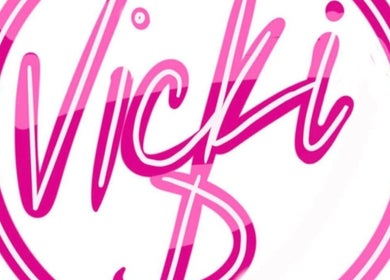 Vicki D logo in pink, symbolizing beauty and wellness in Hoylake, England, GB.
