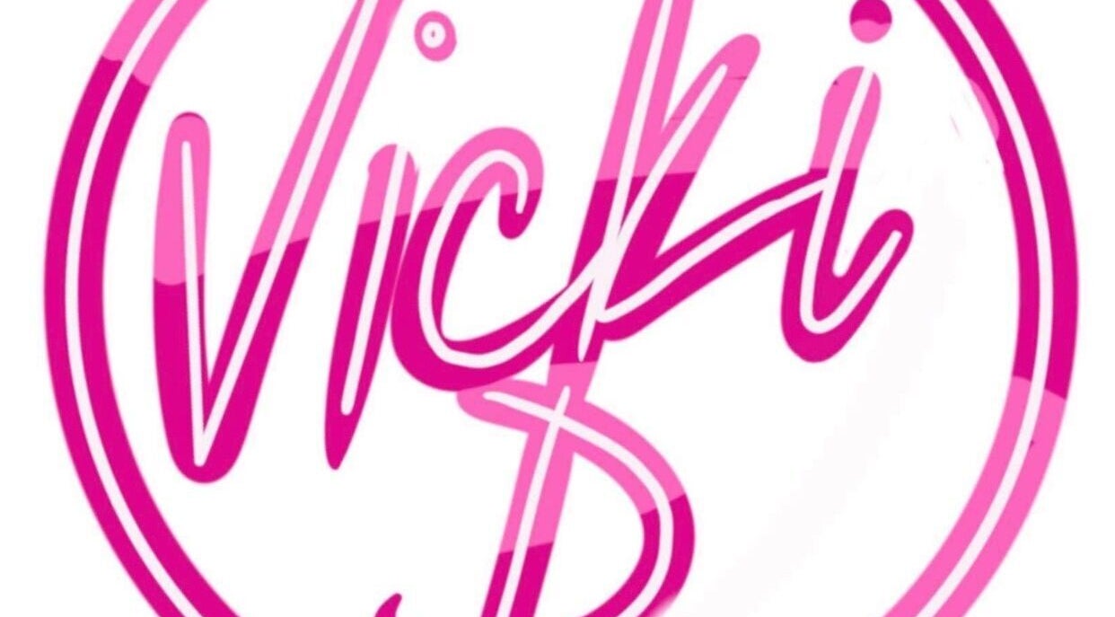 Vicki D logo in pink, symbolizing beauty and wellness in Hoylake, England, GB.