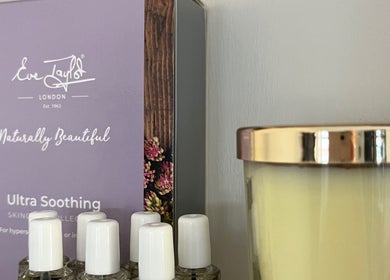 Elegant skincare and candle setup at Peak Perfection in Braintree, England, GB.