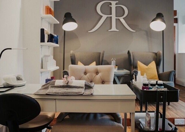 Relaxing spa lounge at Reading Room Day Spa, Lewes, England, GB with cozy chairs and manicure station.