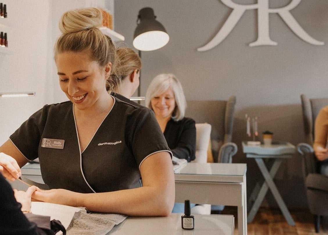 Relaxing manicure session at Reading Room Day Spa, Lewes, England, GB with smiling staff.