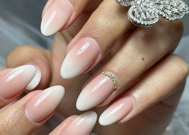 Elegant ombre nails with gems at Eyelash Secret Ladies Salon Iris Bay, Dubai, Dubai, AE.