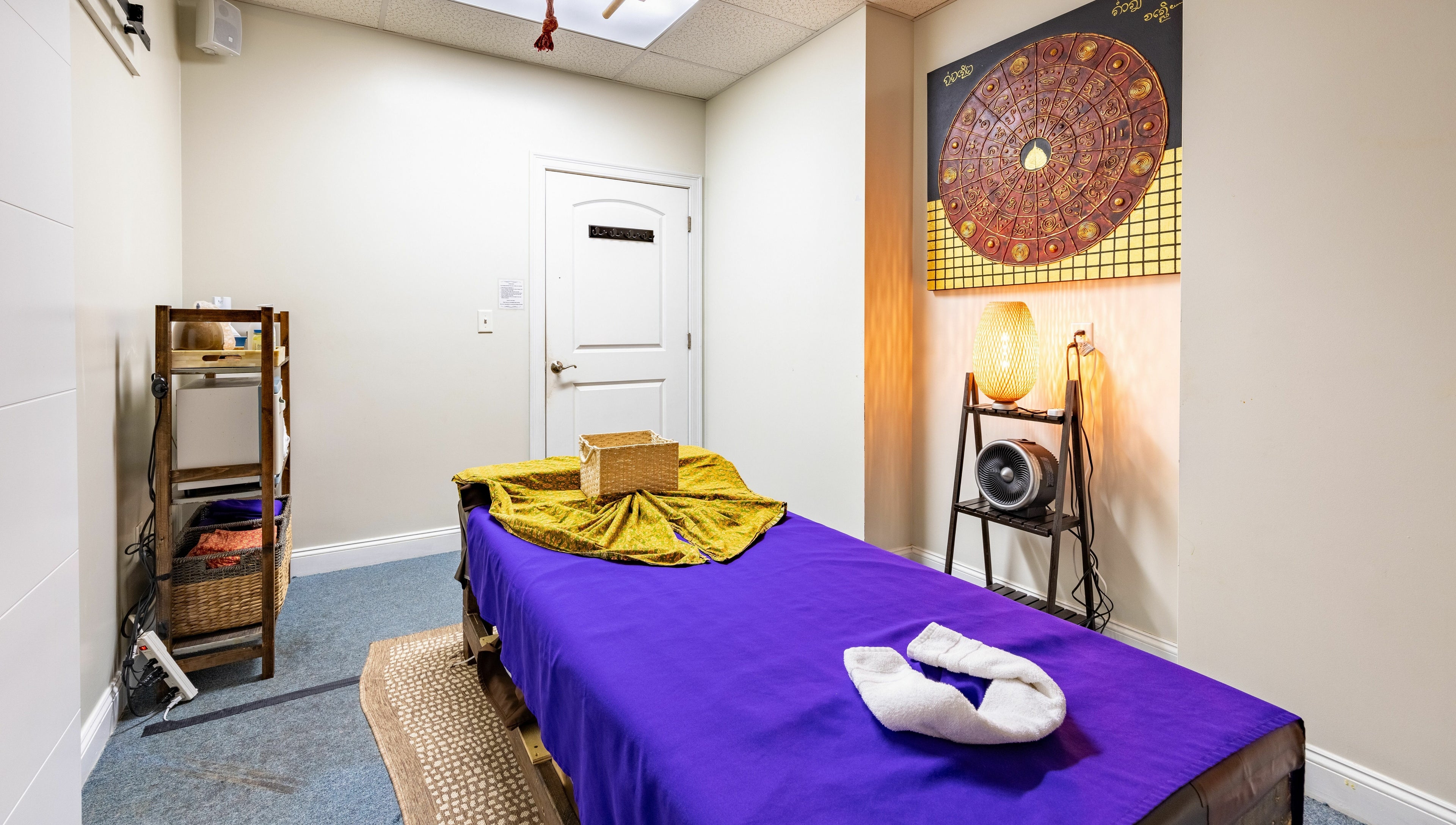 Massage room at La Moon Thai Spa Wilmington, featuring cozy decor in Wilmington, Massachusetts, US.