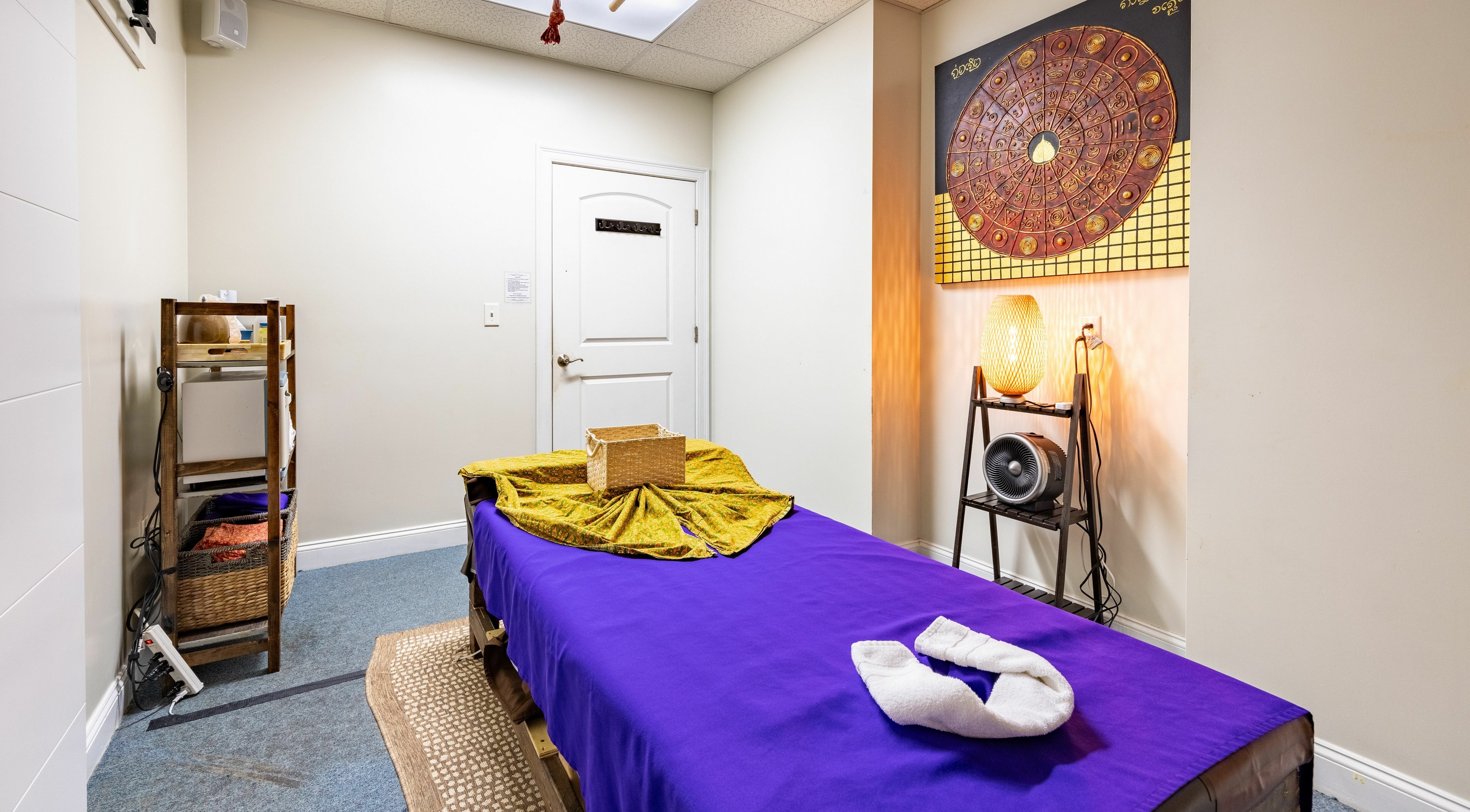 Massage room at La Moon Thai Spa Wilmington, featuring cozy decor in Wilmington, Massachusetts, US.