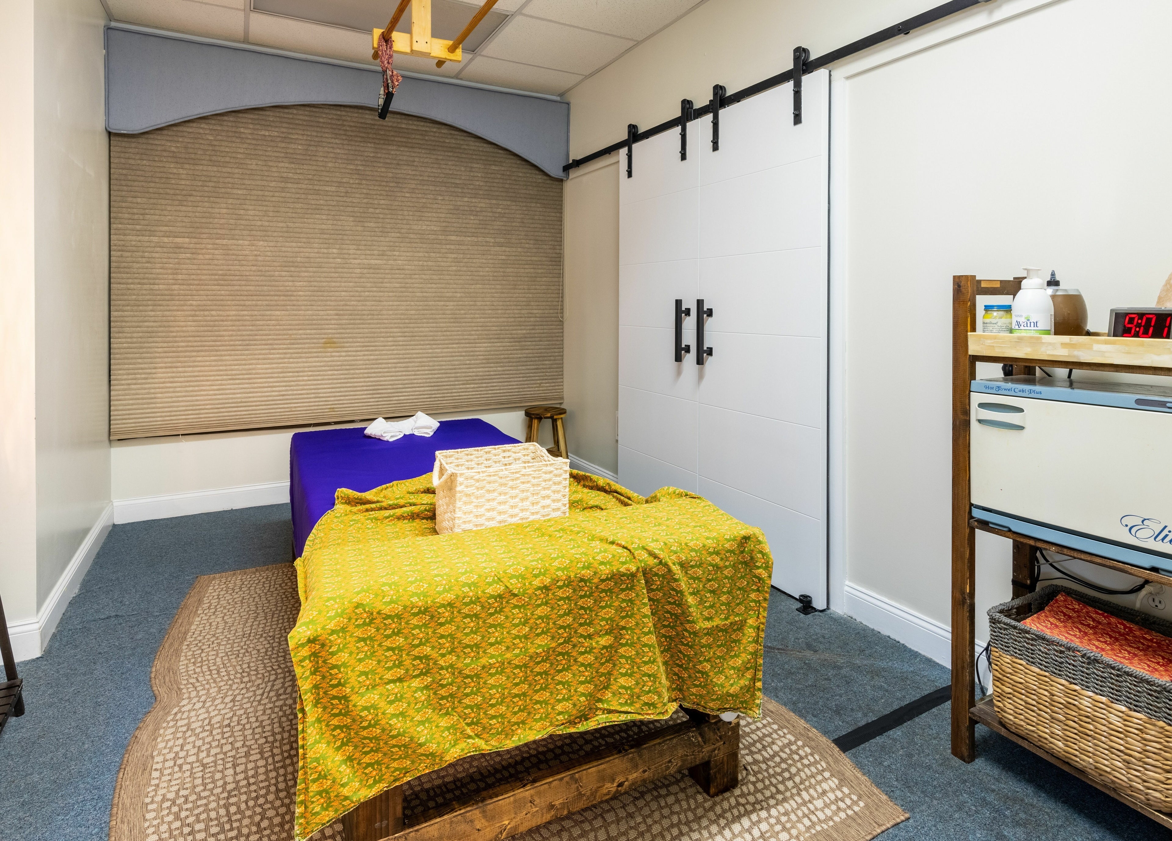 Massage room at La Moon Thai Spa Wilmington, featuring warm lighting and cozy decor in Wilmington, Massachusetts, US.