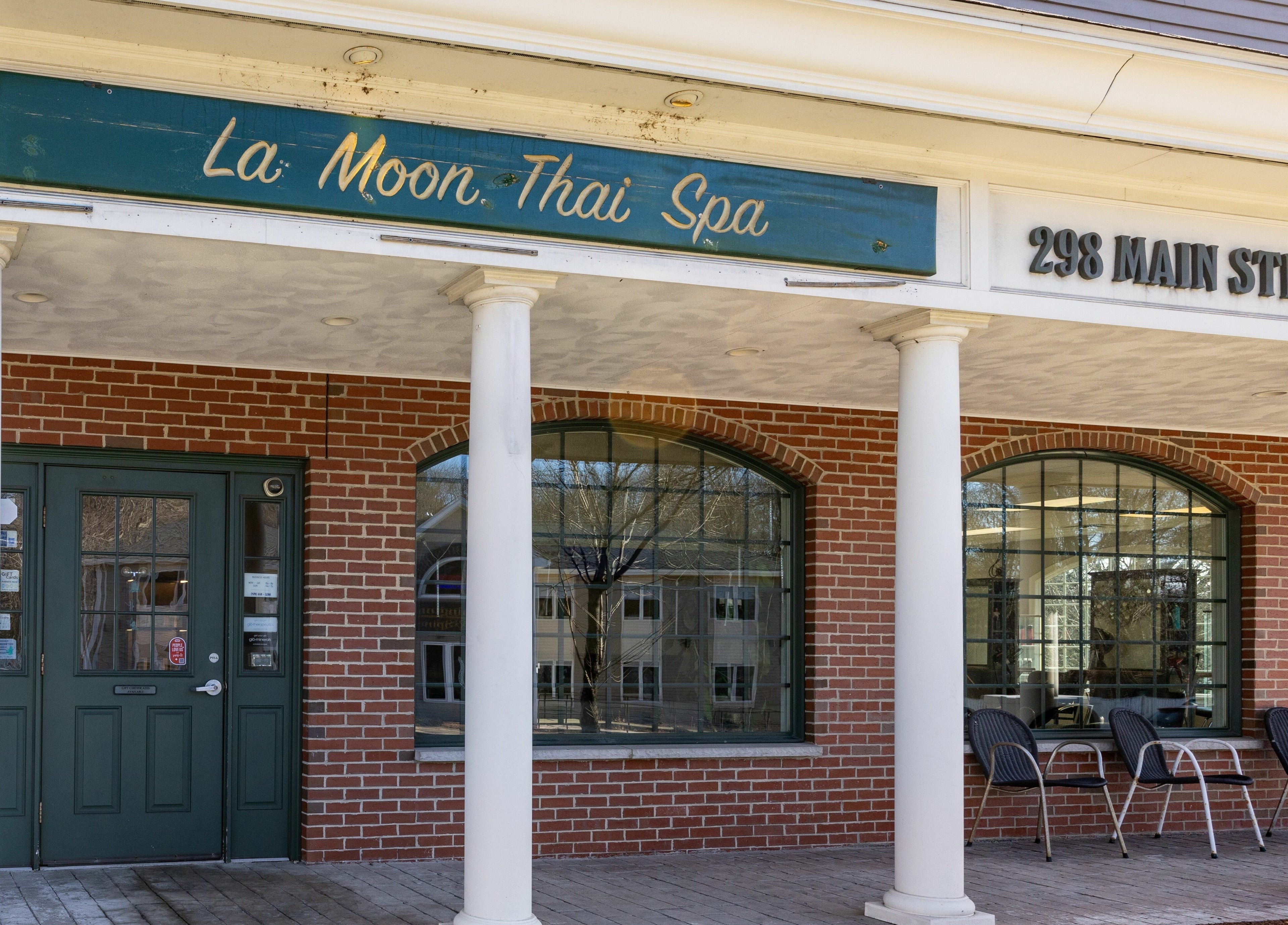 Entrance to La Moon Thai Spa Wilmington with elegant pillars in Wilmington, Massachusetts, US.