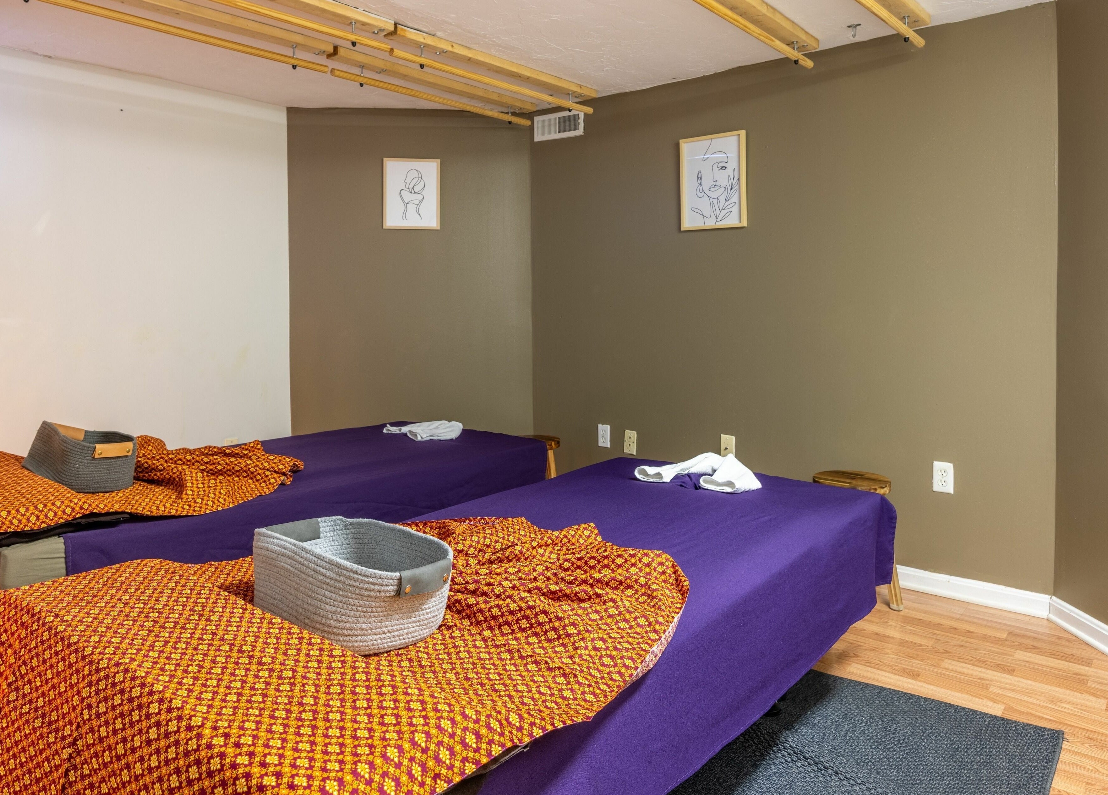 La Moon Thai Spa Cambridge massage room with twin beds in Cambridge, Massachusetts, US offering relaxation.