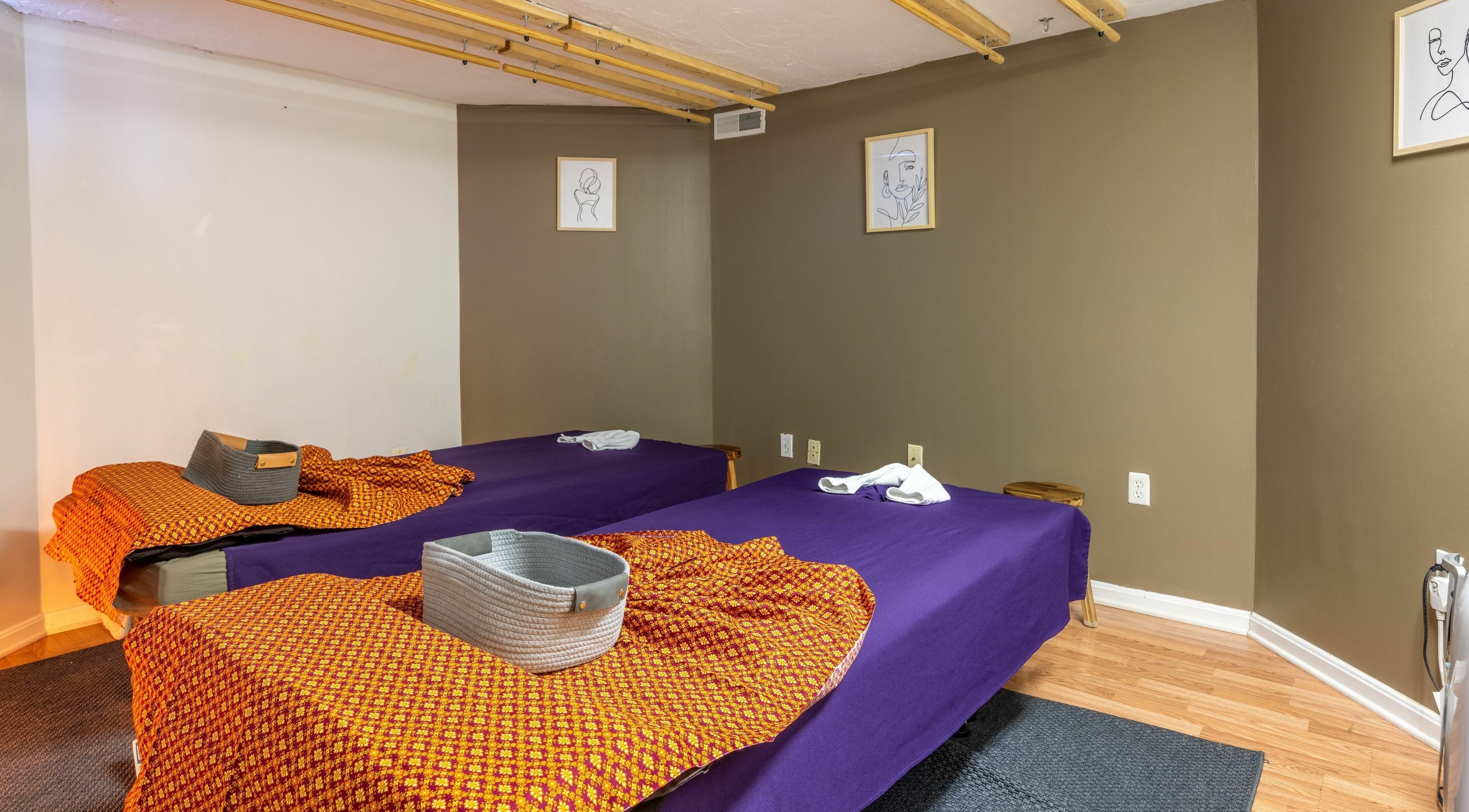 La Moon Thai Spa Cambridge massage room with twin beds in Cambridge, Massachusetts, US offering relaxation.