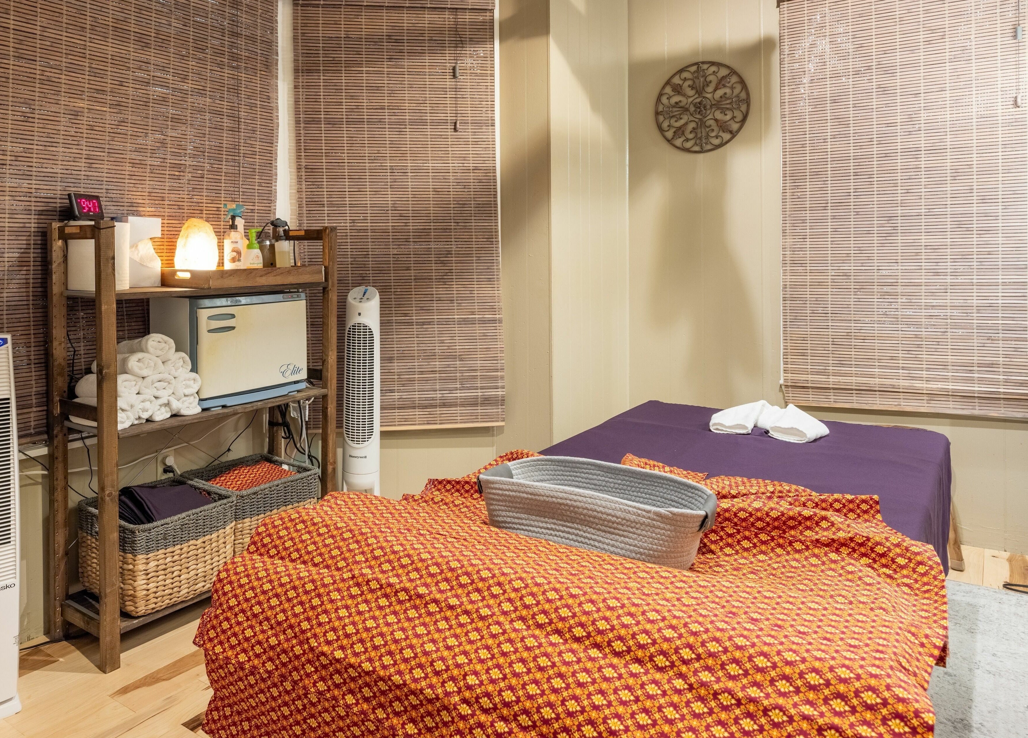 Tranquil massage room at La Moon Thai Spa Cambridge, Massachusetts, US showcasing a cozy and inviting ambiance.