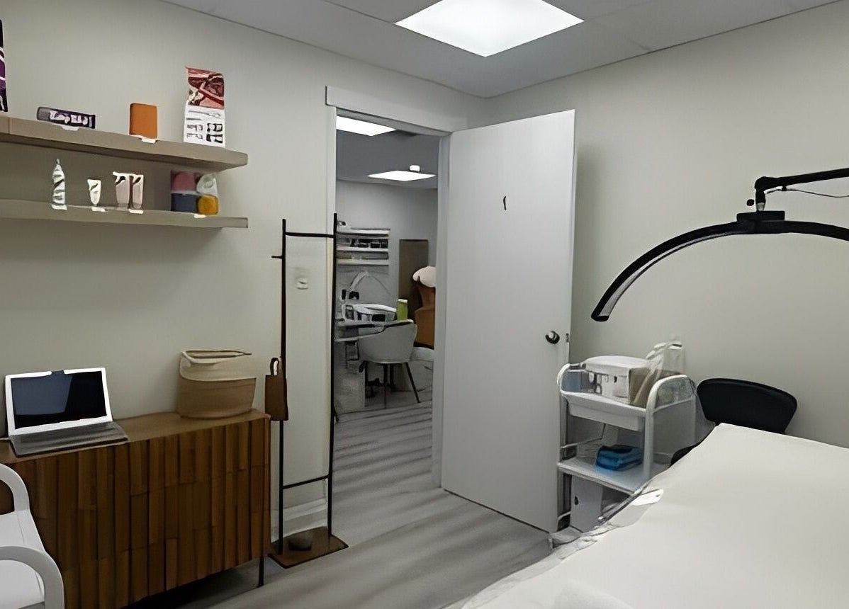 Elegant treatment room at SPAMUZE, Toronto, Ontario, CA, featuring modern decor and advanced wellness facilities.