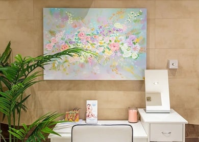 Elegant floral painting at Anir Anun Clinic's calming space in London, England, GB.