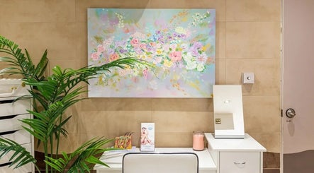 Elegant floral painting at Anir Anun Clinic's calming space in London, England, GB.