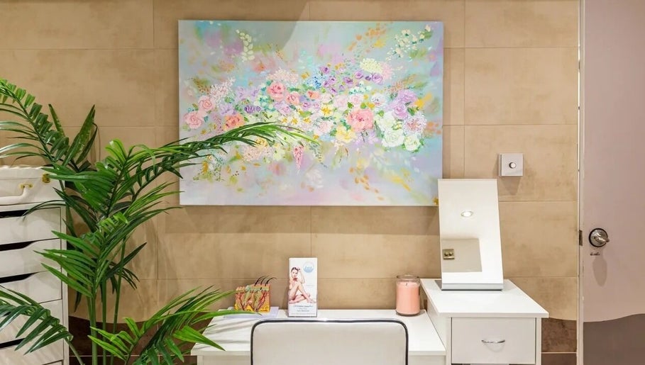 Vibrant floral painting decor in treatment room at Anir Anun Clinic, London, England, GB.