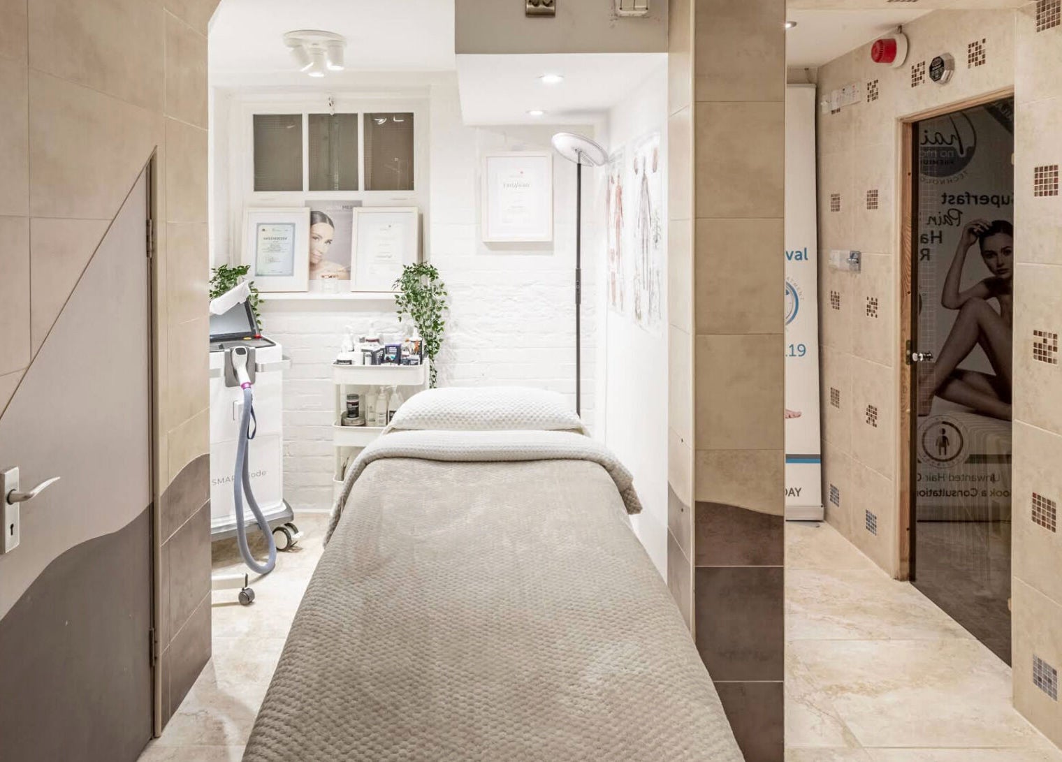 Serene treatment room at Anir Anun Clinic, London, England, GB, featuring a sleek design and modern equipment.